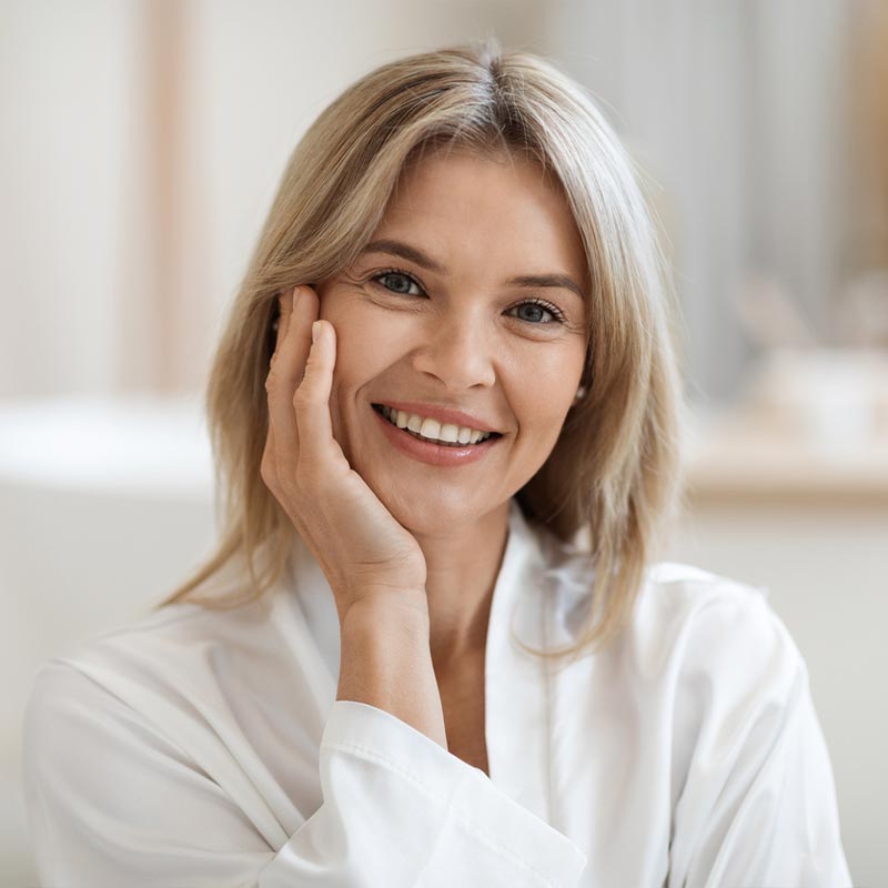 a woman smiling for the camera